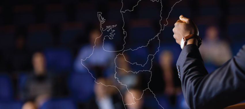 Conferencista en auditorio.